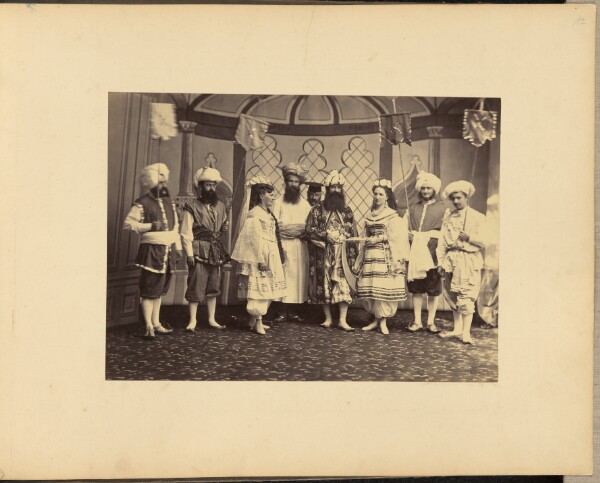Unknown, [Group portrait of men and women in costumes]