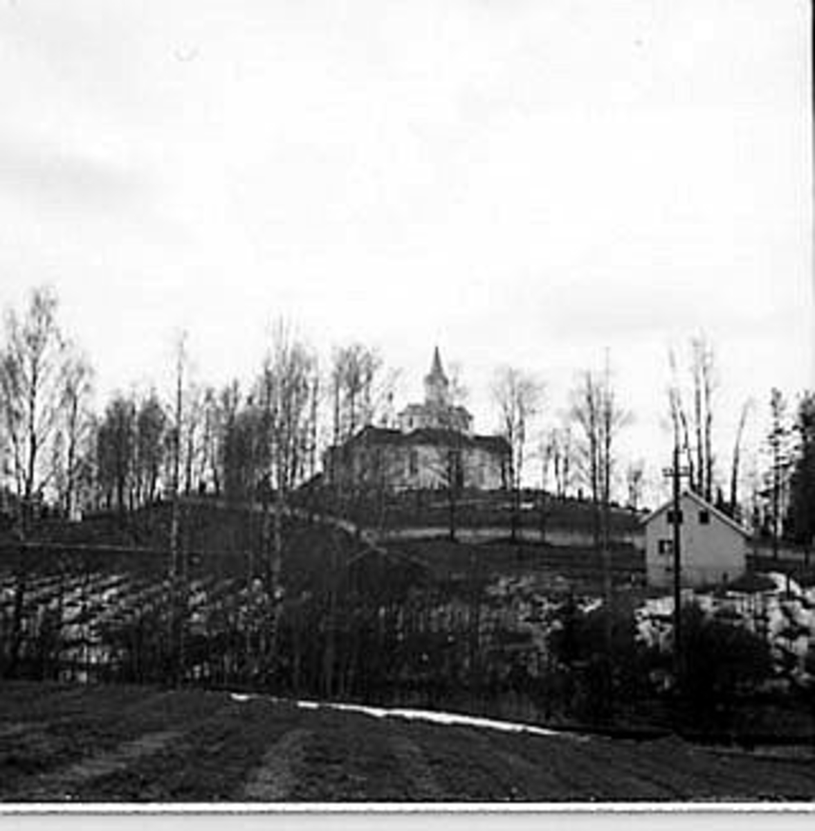 Anno Domkirkeodden, EKSTERIØR: TANGEN KIRKE, TANGEN,