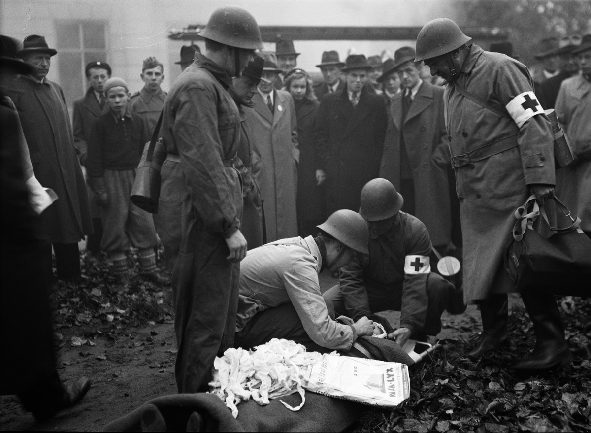 Paul Sandberg, "Överraskningsmoment satte beredskapsavdelningarna på hårda prov" - "skadade tas omhand", Luthagsesplanaden, Uppsala 1941