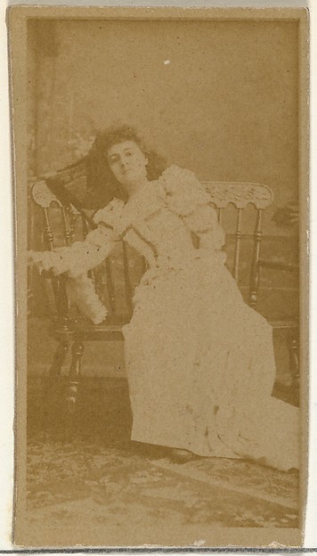 W. Duke, Sons & Co., [Actress reclining on wooden seat], from the Actors and Actresses series (N145-8) issued by Duke Sons & Co. to promote Duke Cigarettes