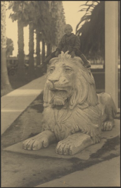 Louis Fleckenstein, [Child on Lion Statue]