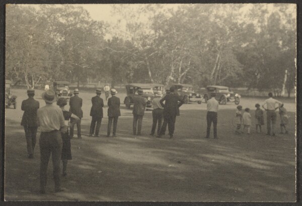 Louis Fleckenstein, [Crowd in Park Looking at Cars]