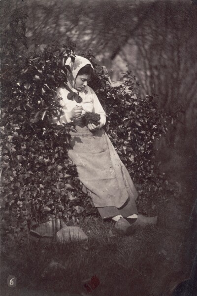 Unknown, [Peasant woman holding small animal]