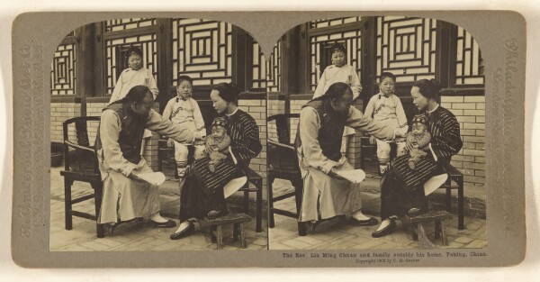 Carleton H. Graves, The Rev. Liu Ming Chuan and family outside his home. Peking, China.
