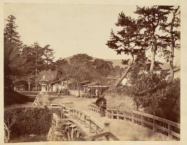 Unknown, [Man standing on a bridge]