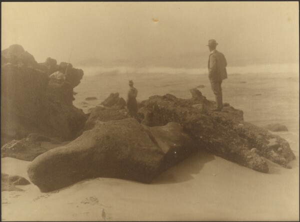 Louis Fleckenstein, [Three Men Fishing from Rocks on Beach]