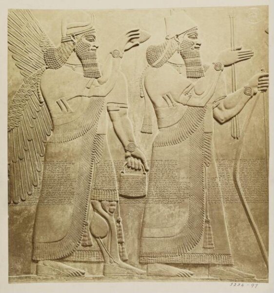 Unknown, Assyrian relief of King Ashurnasirpal II and a god from Nimroud, ca. B.C. 884. London, British Museum