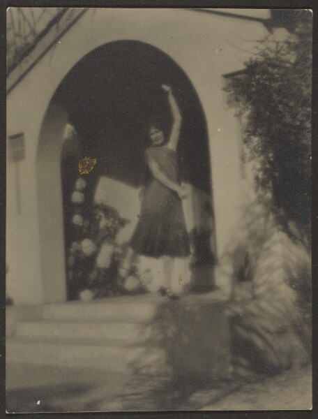 Louis Fleckenstein, [Female Dancer before House]