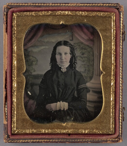 Unknown, [Portrait of a Seated Woman with Curly Hair]