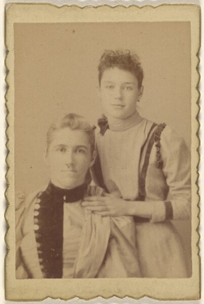 Unknown, [Mother seated, daughter standing]