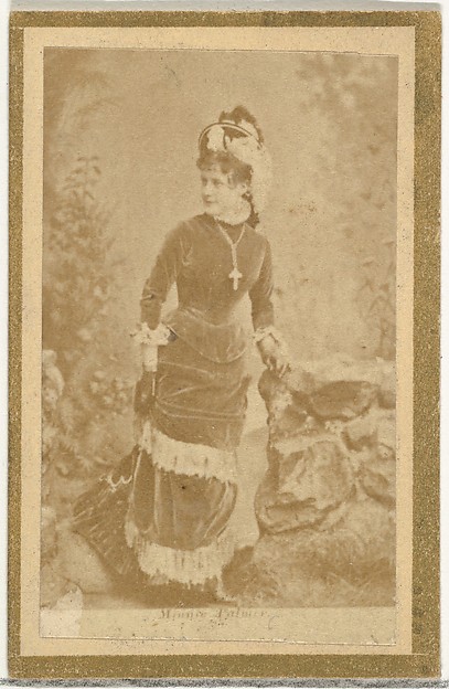 Allen & Ginter, Minnie Palmer, from the Actresses and Celebrities series (N60, Type 2) promoting Little Beauties Cigarettes for Allen & Ginter brand tobacco products