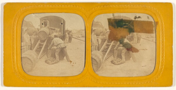 Unknown, [Men loading barrels on a train]