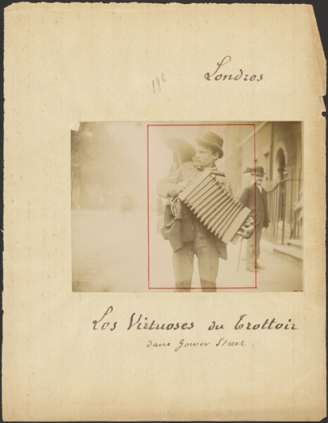Unknown, [Accordion player with monkey]