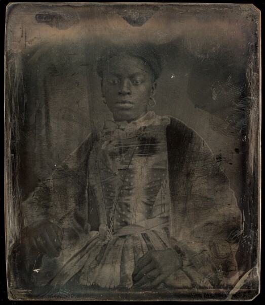 Unknown, [Portrait of a seated black woman in fancy dress]