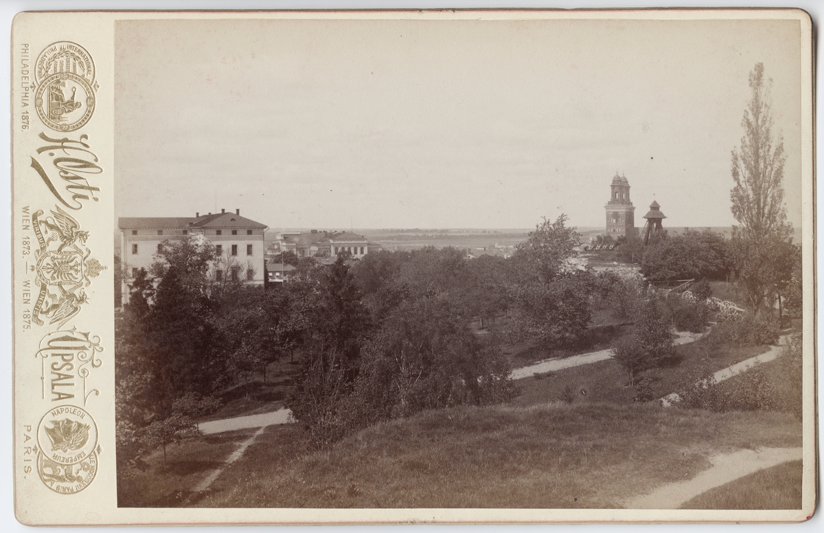 Henri Osti's Fotografiateliér, View from Gräsgårdsbastion at Uppsala Castle towards Styrbishop with Gunillaklockan and Carolina Rediviva, University House and Uppsala Cathedral 1886
