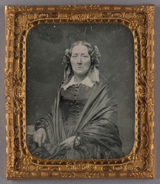 Unknown, [Portrait of a Seated, Middle-aged Woman with Hair Ribbons]