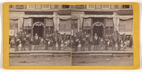 Unknown, [Musical group of Ed. Lindsey's Comedy Concert Co. posed in front of M. Sherman Jeweler store, possibly at Keene, New Hampshire]