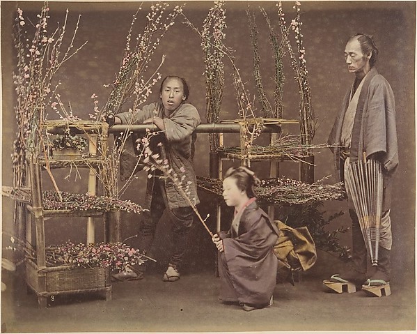 Unknown, [Two Japanese Men and One Japanese Woman Posing with Flowering Branches]