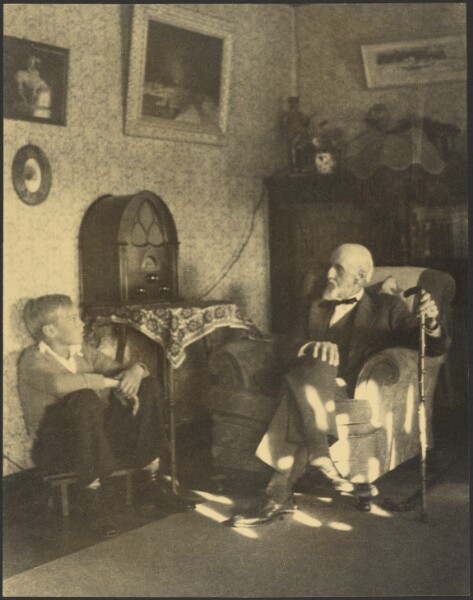 Louis Fleckenstein, [Man and Boy Seated in a Study]
