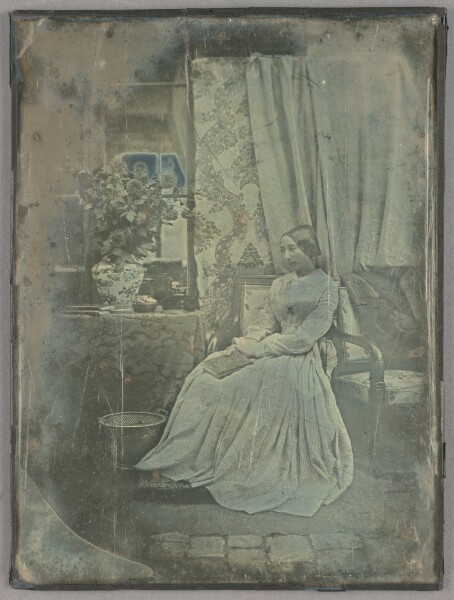 Unknown, [Portrait of a woman seated in a parlor setting]