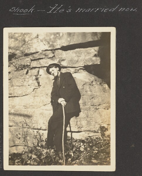 Unknown, [View of Man Posing Against Boulder]