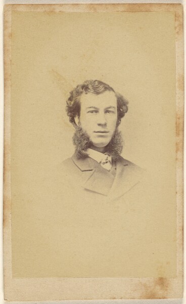 Unknown, [Unidentified man with extremely long muttonchops, printed in vignette-style]