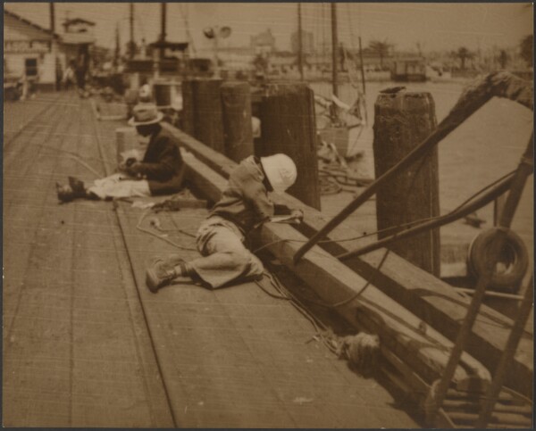 Louis Fleckenstein, [Men Seated on Dock]