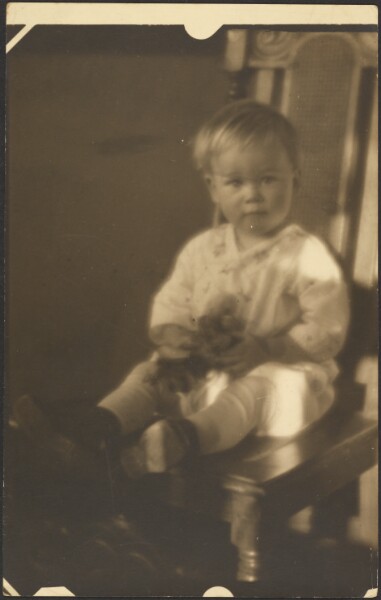 Louis Fleckenstein, [Child on Big Chair]