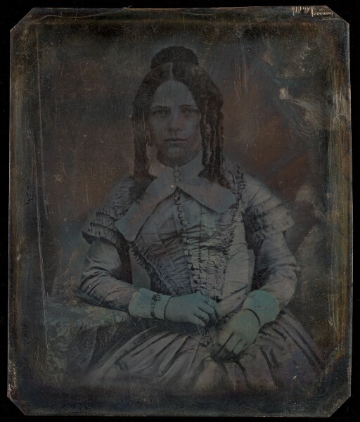 Unknown, [Portrait of a seated woman with hair in ringlets]