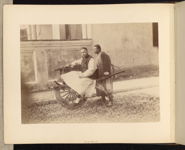 Unknown, [Wheelbarrow Driver and Passenger]