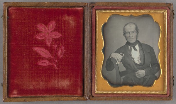 Unknown, [Portrait of a Seated Man Holding a Key]