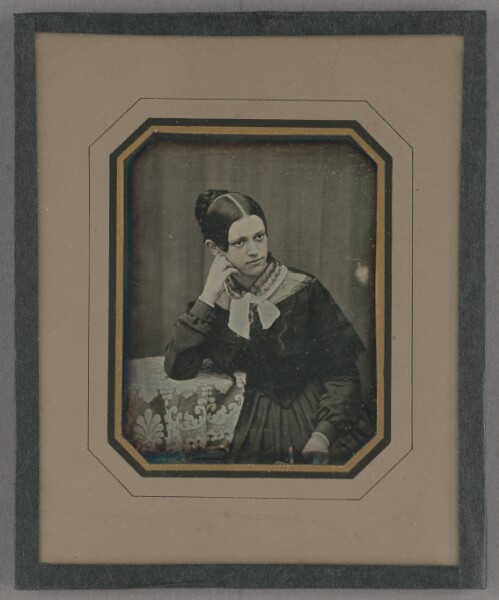 Unknown, [Portrait of a Seated Woman at a table]