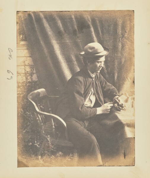 A. J. Russell, [Man with auger]