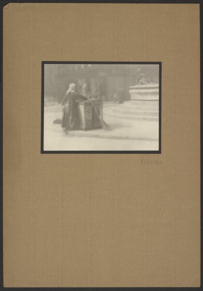 Günther Krampf, [Woman with broom on street]