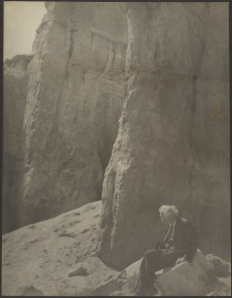 Louis Fleckenstein, [Elderly Man in Rocky Landscape]