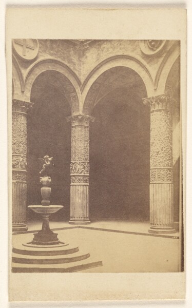 Fratelli Alinari, [Unidentified interior of arches, columns and single fountain, somewhere in Italy]